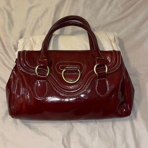 Sofia C. Blood red patent leather handbag